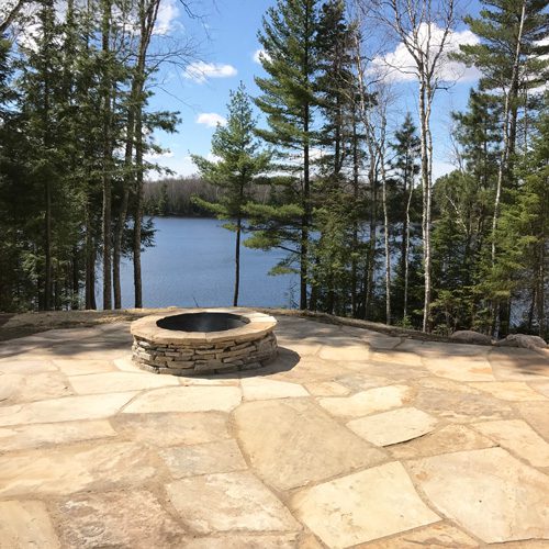 lake-home-rustic-cabin-stone-patio-firepit-1